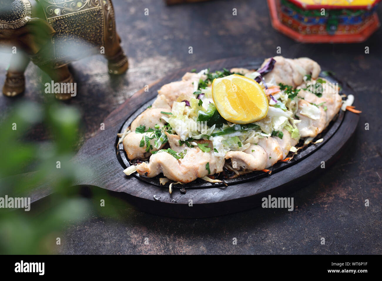 Malai tikka de poulet sur un plat chaud Banque D'Images