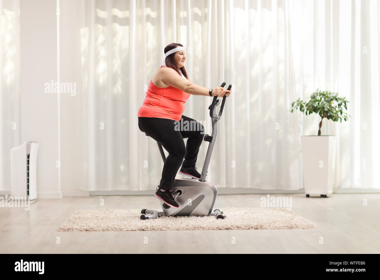 Obese exercise bike Banque de photographies et d'images à haute résolution  - Alamy