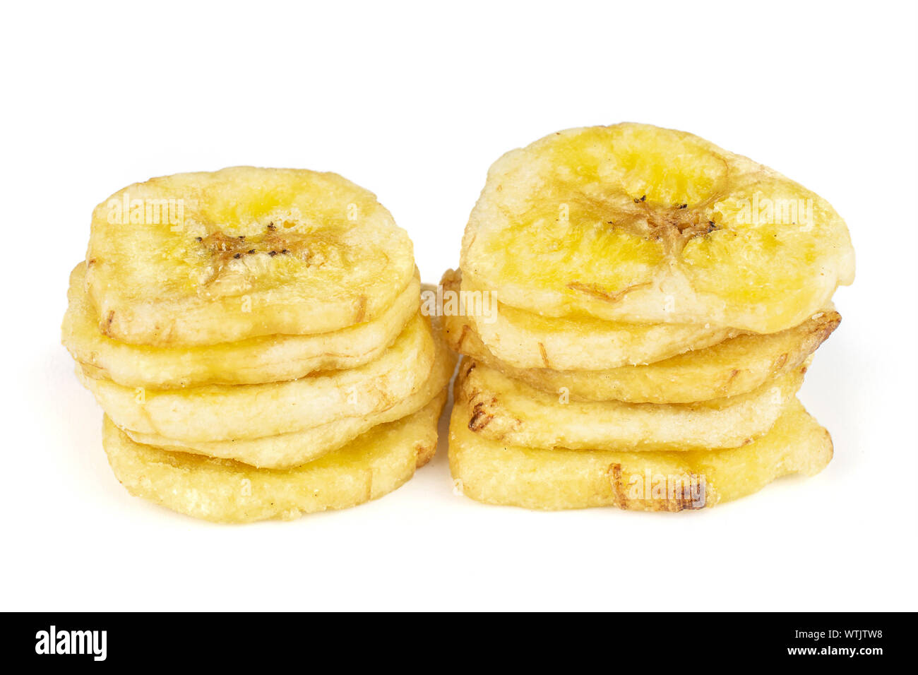 Groupe des dix tranches de banane sec jaune isolé sur fond blanc Banque D'Images