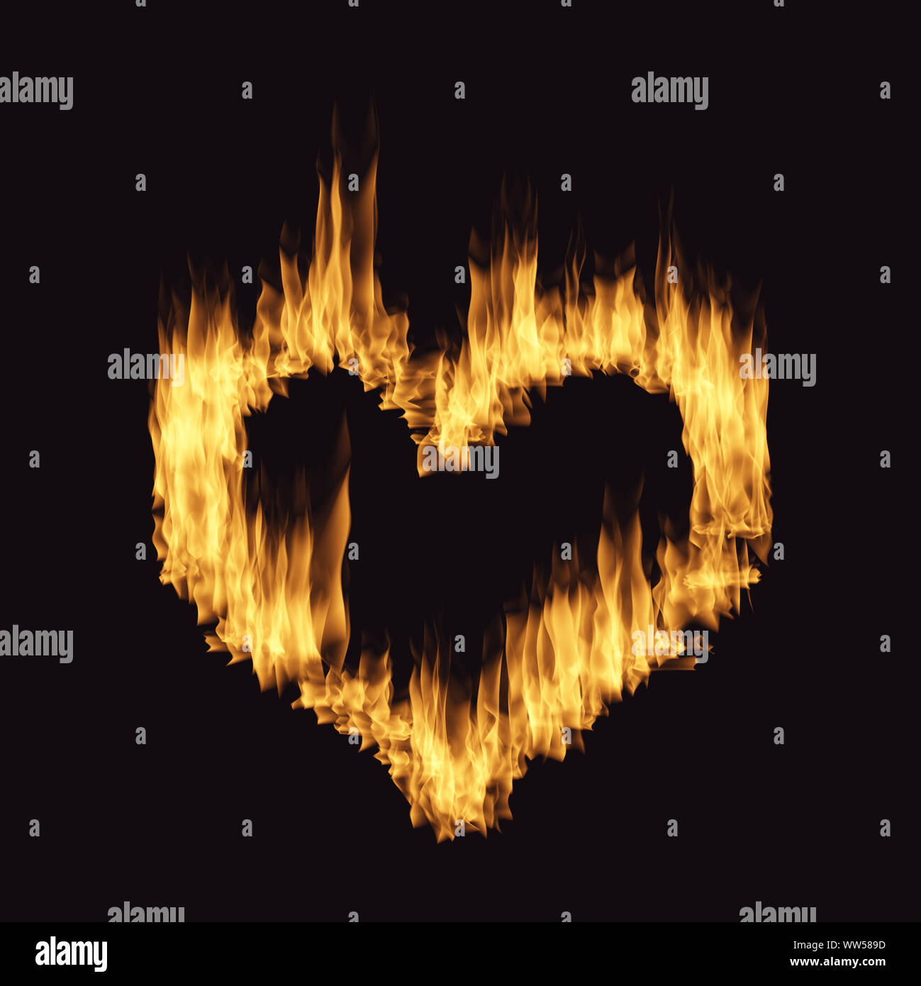 Coeur de flamme isolé sur le fond noir Banque D'Images
