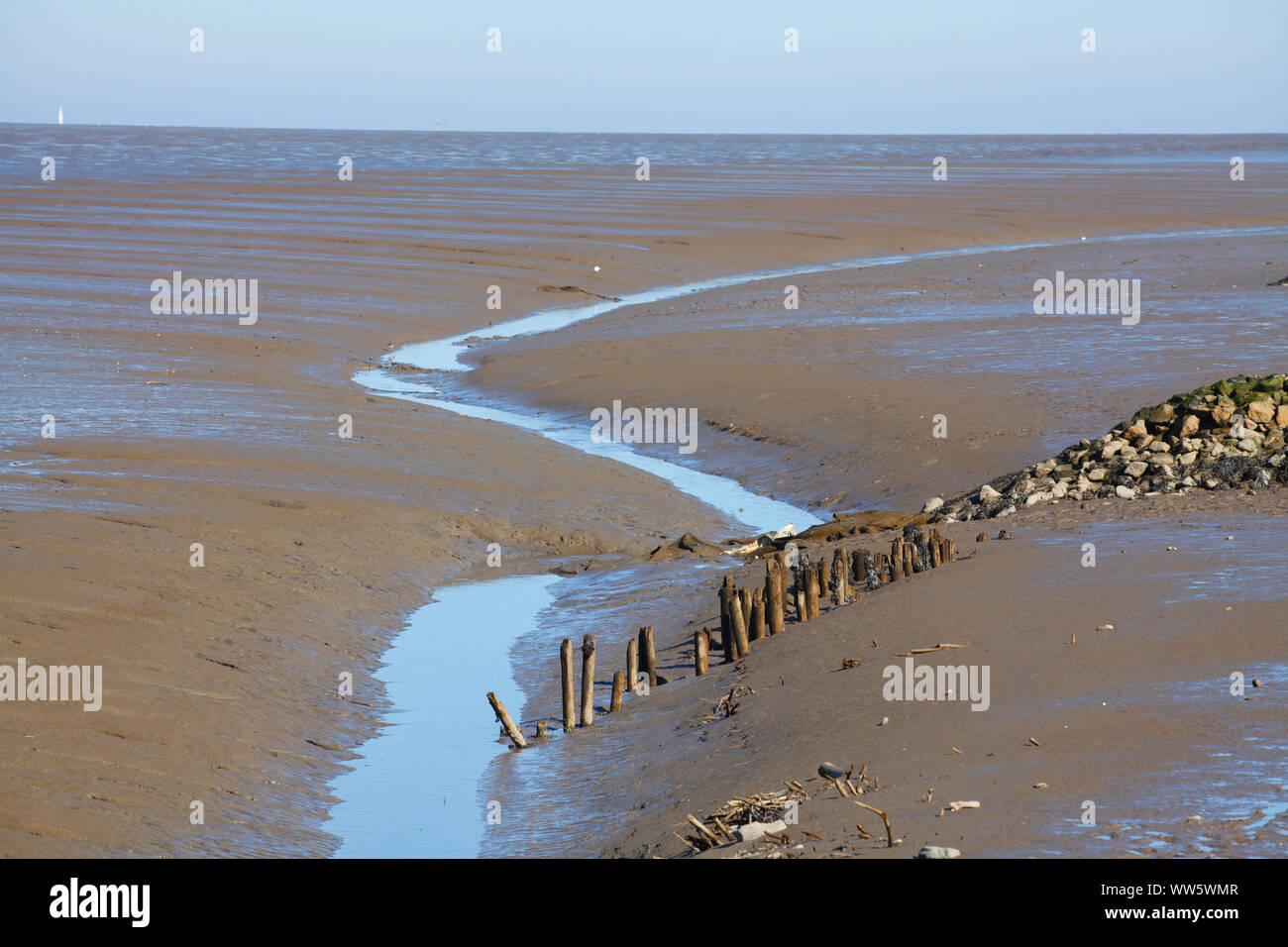 Tideway, brise-lames dans la vasière à marée basse, Wremen, Basse-Saxe, Allemagne, Europe Banque D'Images