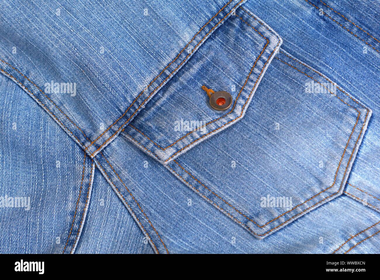 Détail de texture denim usé bleu close up. Banque D'Images