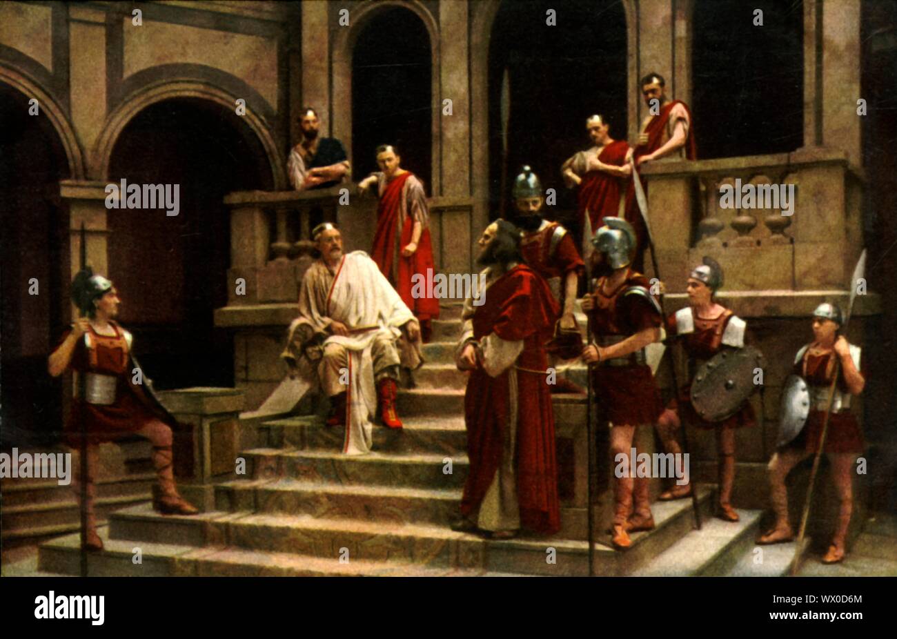 Jésus devant Pilate, 1922. Jésus (Anton Lang) apparaît devant le gouverneur romain Ponce Pilate (Hans Mayr) : les joueurs dans le jeu de la passion d'Oberammergau. La pièce est jouée tous les 10 ans, sur les stades en plein air, par les habitants du village d'Oberammergau, en Bavière, Allemagne. Première mise en scène en 1634, la pièce raconte l'histoire de la passion de Jésus, jusqu'à sa crucifixion. L'événement est devenu une attraction touristique, avec un public venant de partout dans le monde. Carte postale officielle du jeu de la passion d'Oberammergau 1922. [F. Bruckmann, Munich, Allemagne, 1922] Banque D'Images