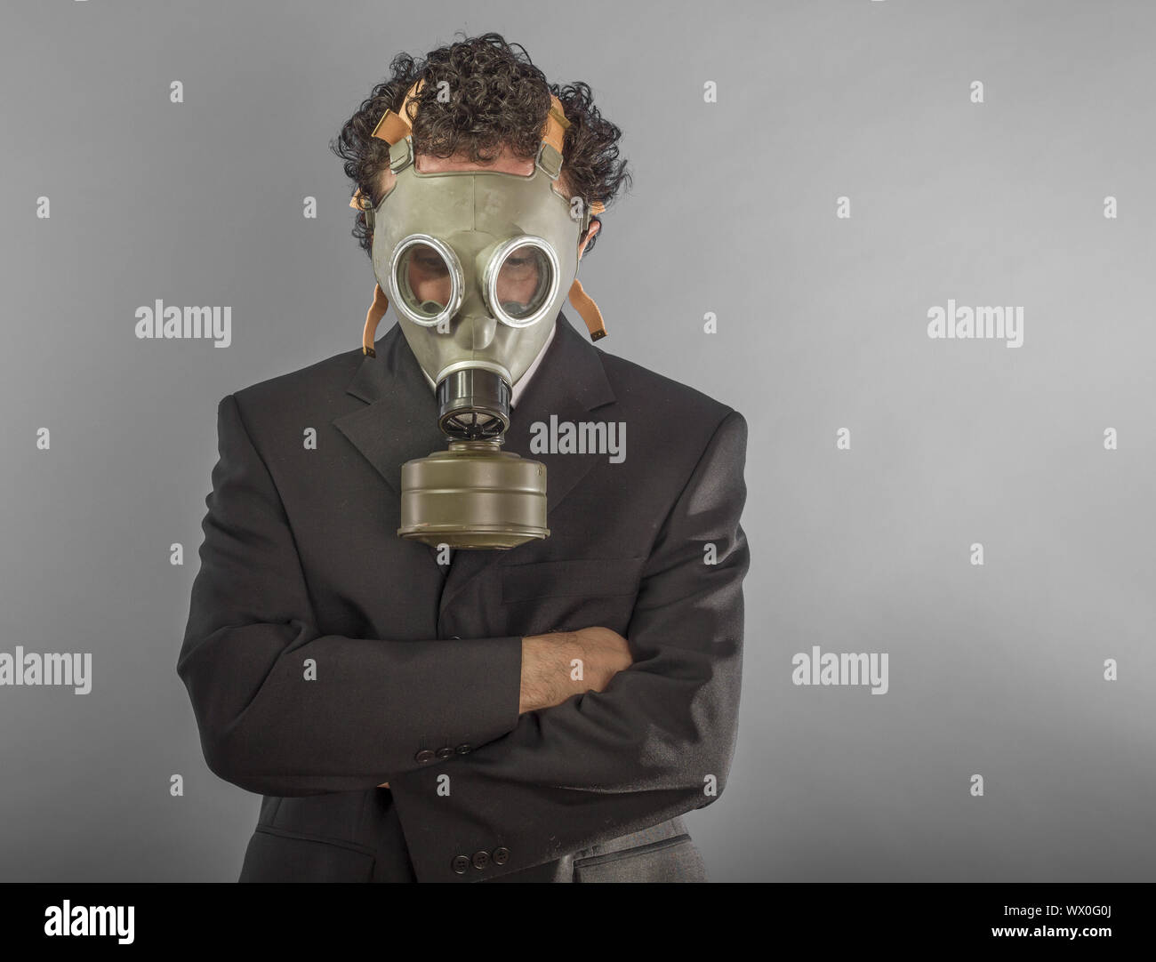 Businessman with gas mask, business concept dangereux pour l'environnement ou pour la société Banque D'Images