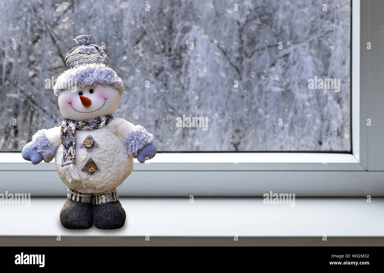 Carte de vœux de Noël avec l'image d'un bonhomme de neige. Banque D'Images