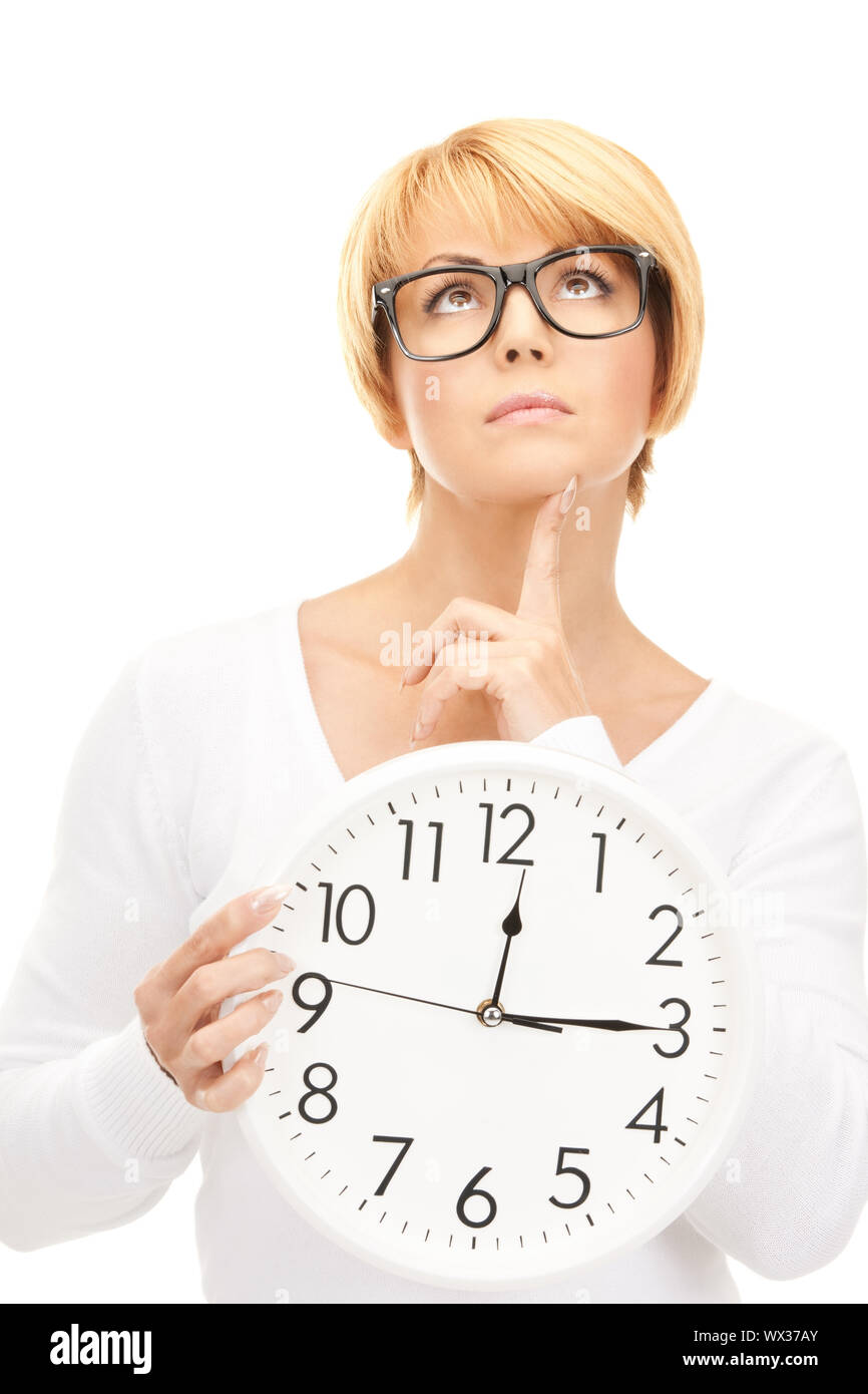 Woman holding grosse horloge Banque D'Images