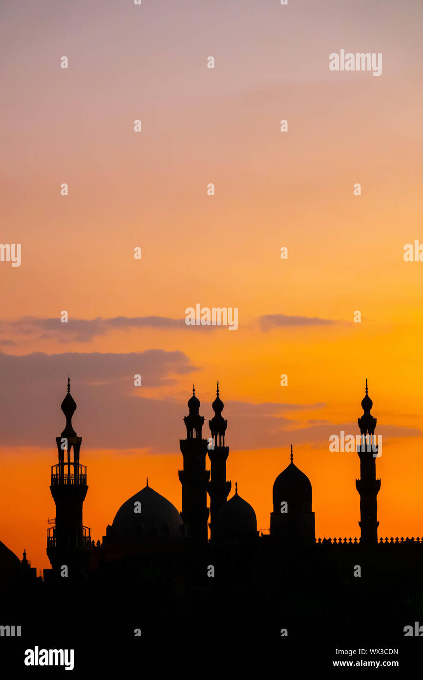 Les deux mosquées Al-Rifa'i et Sultan Hassan au Caire en Égypte au coucher du soleil Banque D'Images