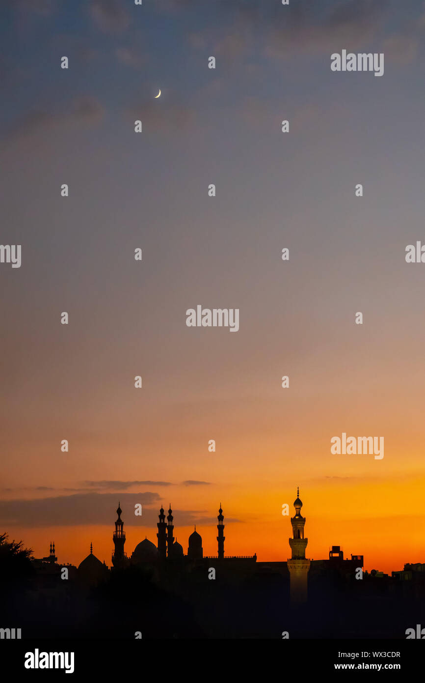 Les deux mosquées Al-Rifa'i et Sultan Hassan au Caire en Égypte au coucher du soleil Banque D'Images
