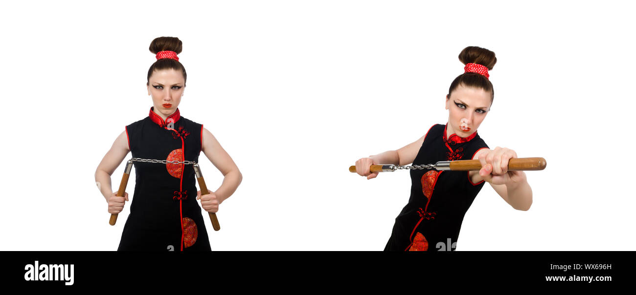 Femme drôle avec nunchucks isolated on white Banque D'Images