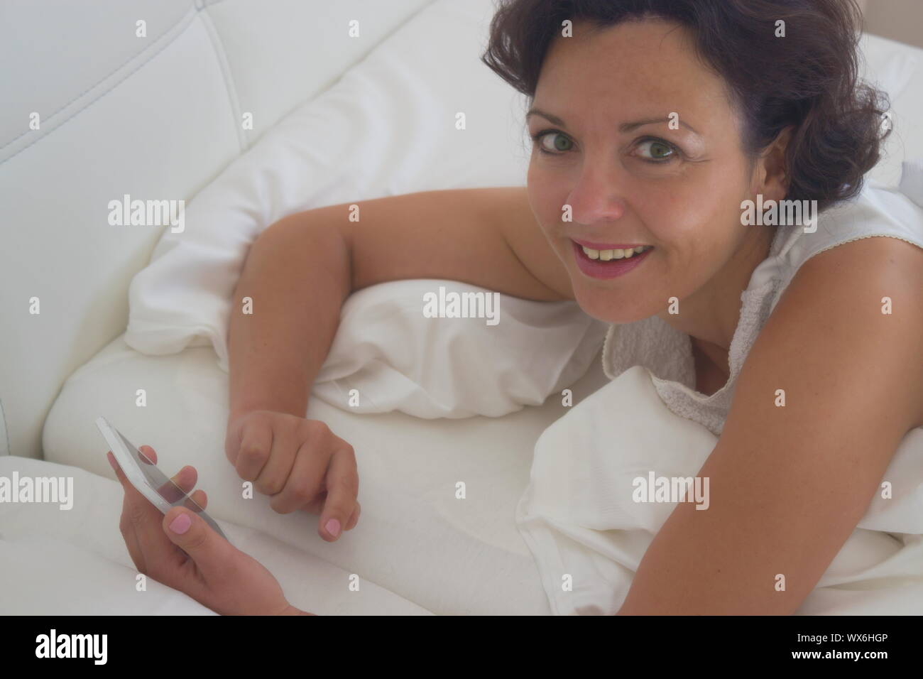 SMS au lit Banque D'Images