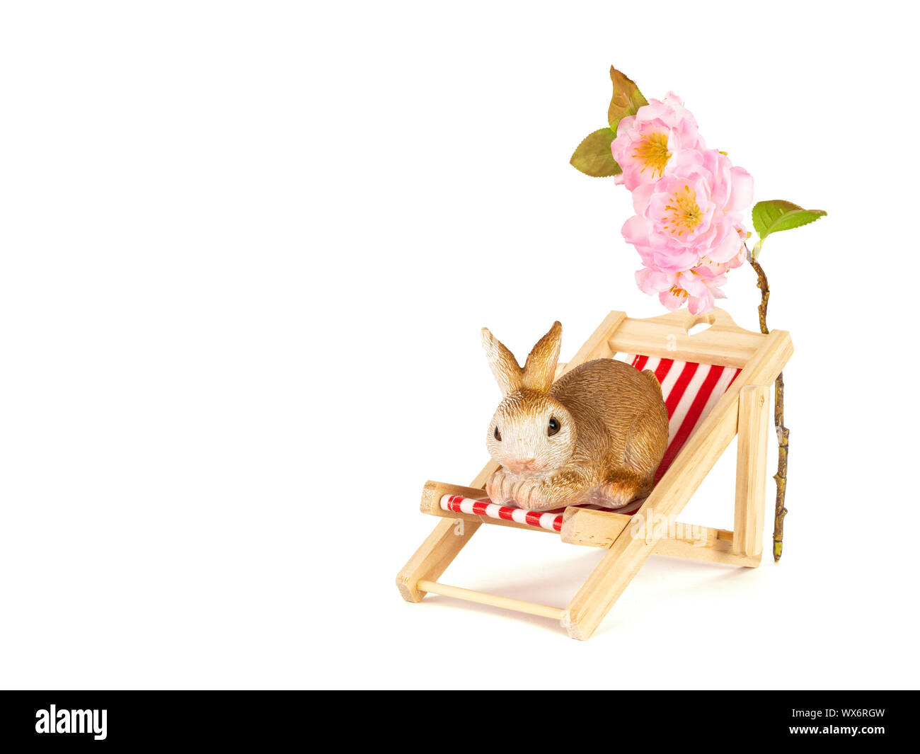 Lapin dans un doux soleil président décoration de Pâques Banque D'Images