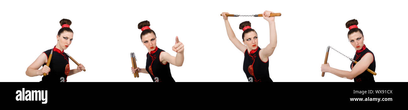 Femme drôle avec nunchucks isolated on white Banque D'Images