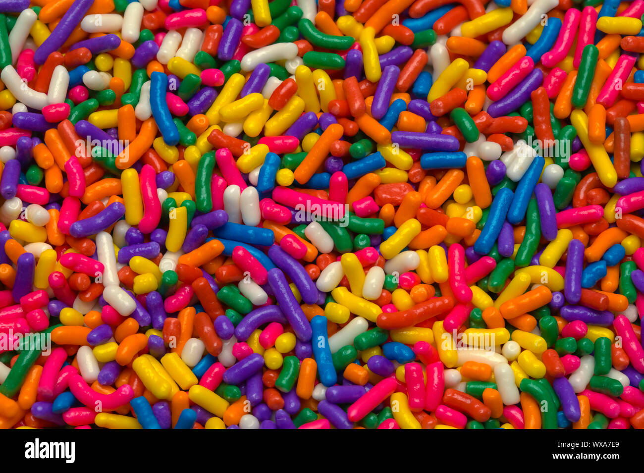 Bonbons et biscuits Couleur arrière-plan. Sprinkles Cupcake Banque D'Images