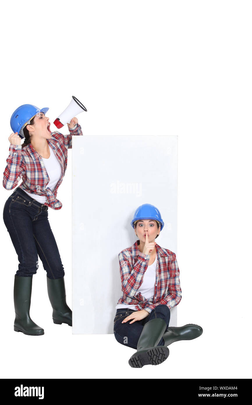 Photo-montage de femme building worker gesturing Banque D'Images