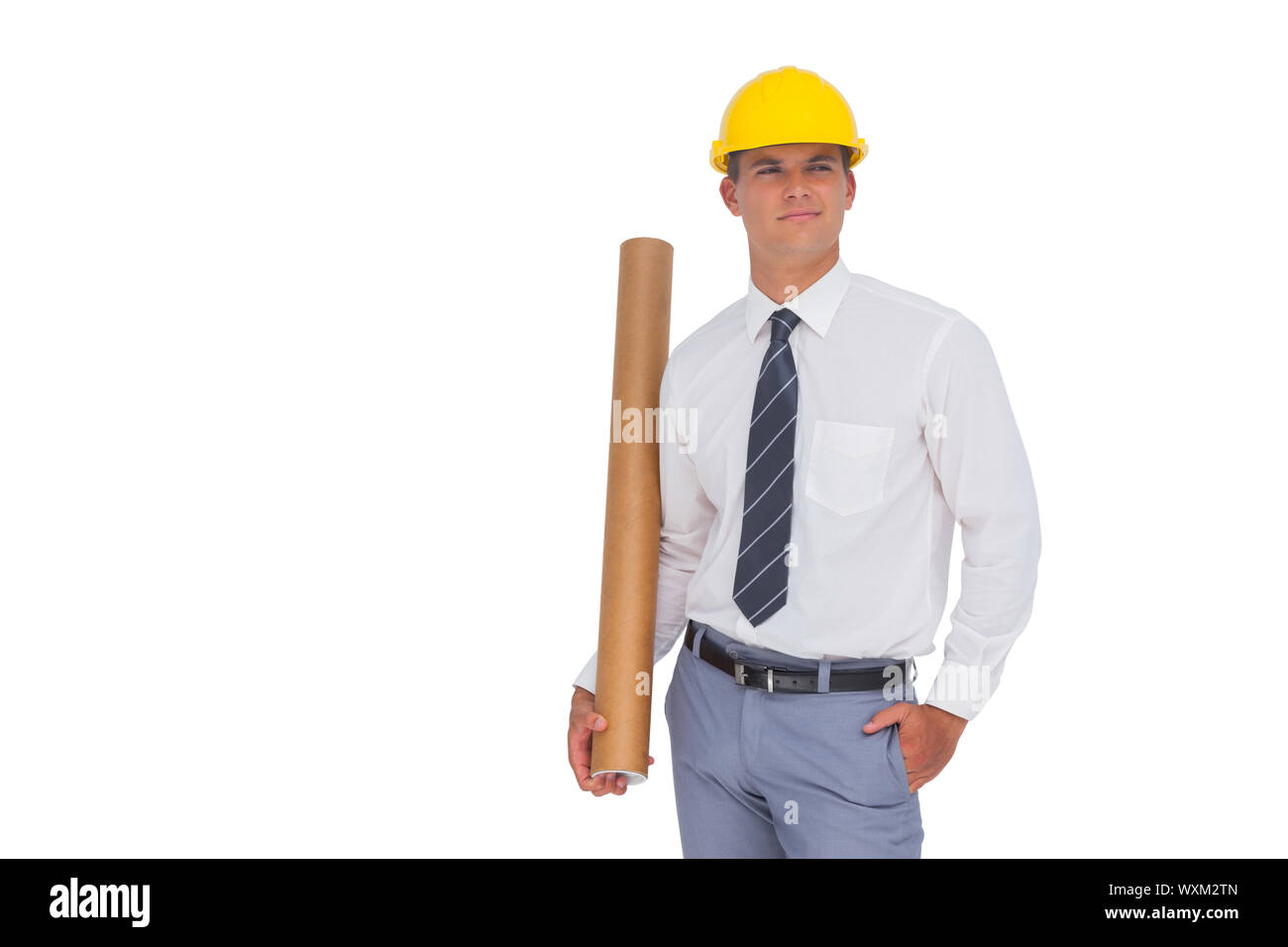 Happy architect holding blueprint a roulé sur fond blanc Banque D'Images