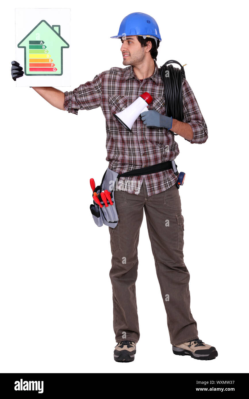 Electricien enseigner aux gens au sujet de l'efficacité énergétique Banque D'Images