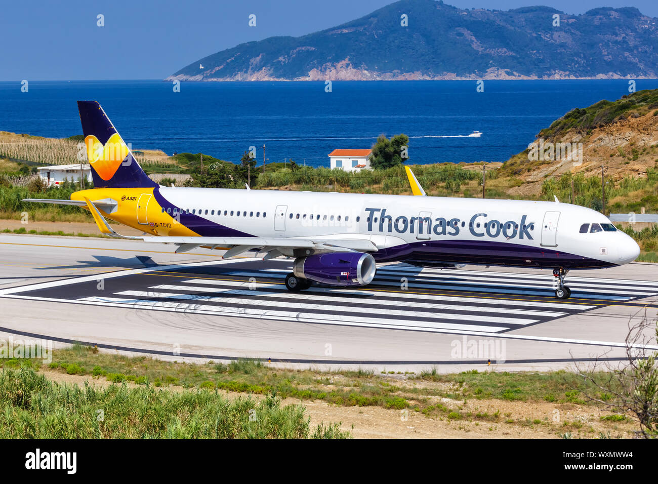 Skiathos, Grèce - Août 2, 2019 Thomas Cook : Airbus A321 avion à l'aéroport de Skiathos (JSI) en Grèce. Banque D'Images
