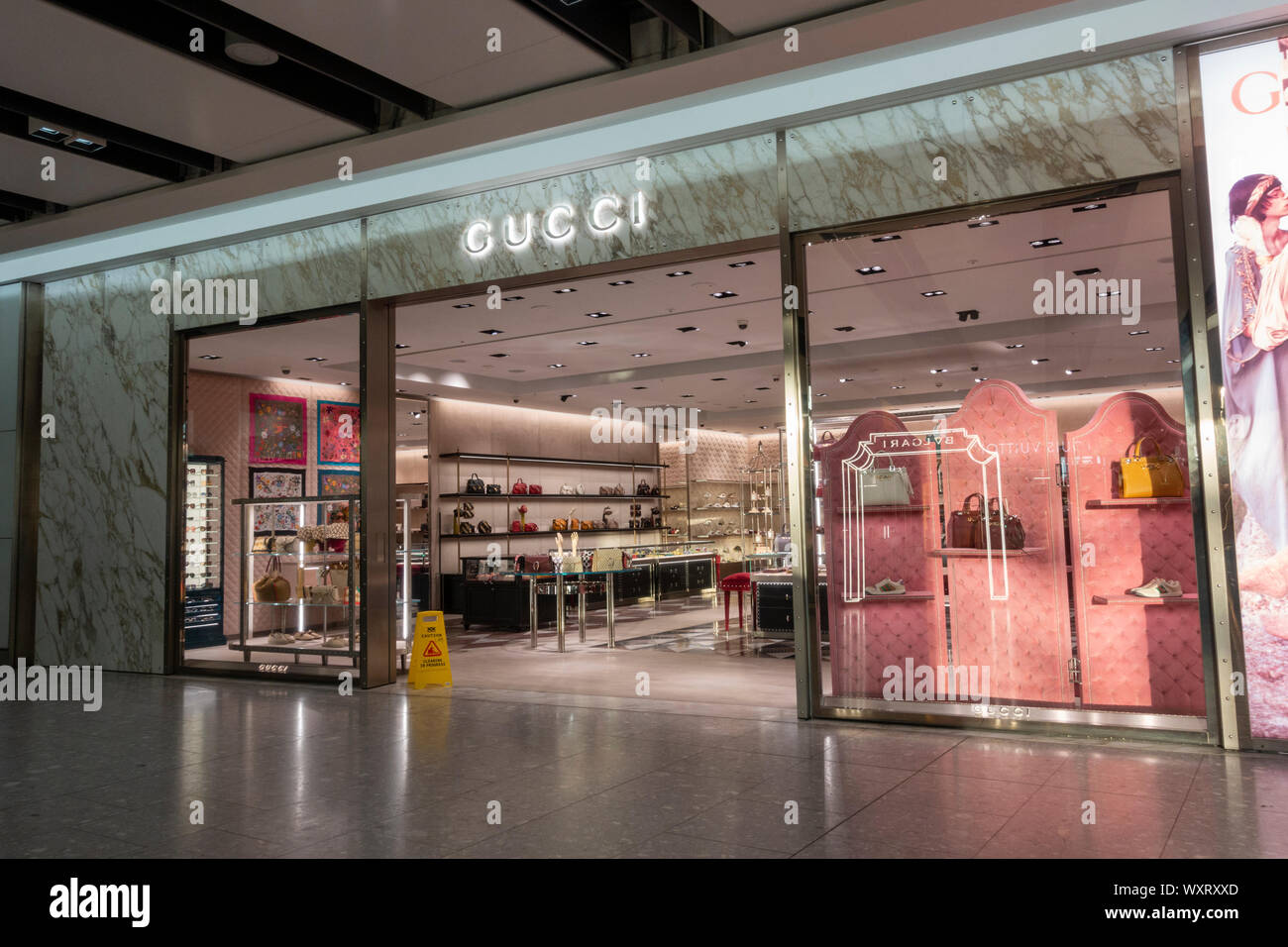 Succursale de Gucci dans Terminal 5 de Londres Heathrow, Londres, Royaume-Uni. Banque D'Images