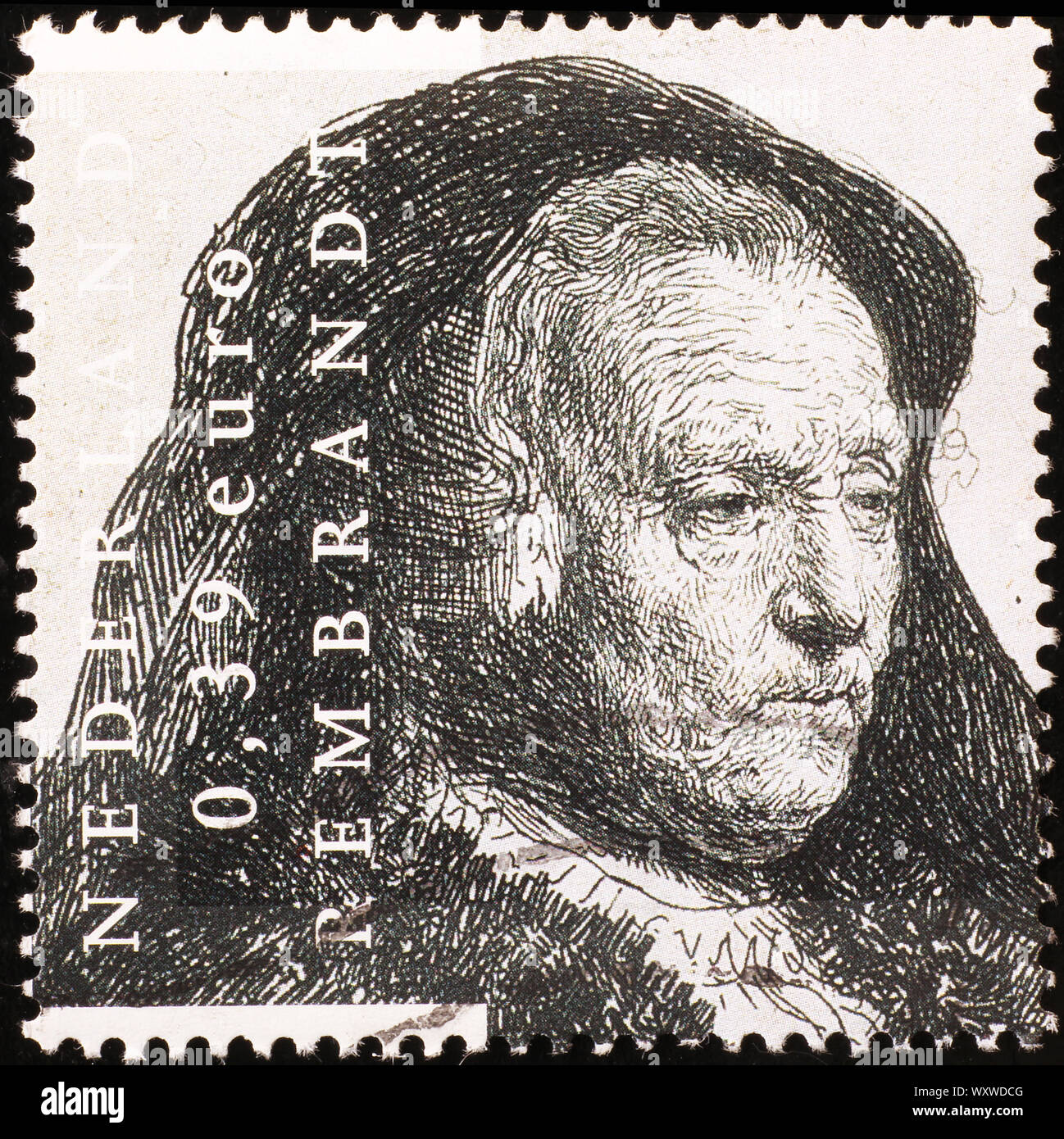 Old woman portrait de Rembrandt sur timbres néerlandais Banque D'Images