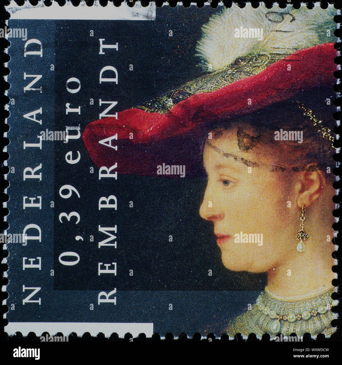 Woman with hat portrait de Rembrandt sur timbres néerlandais Banque D'Images