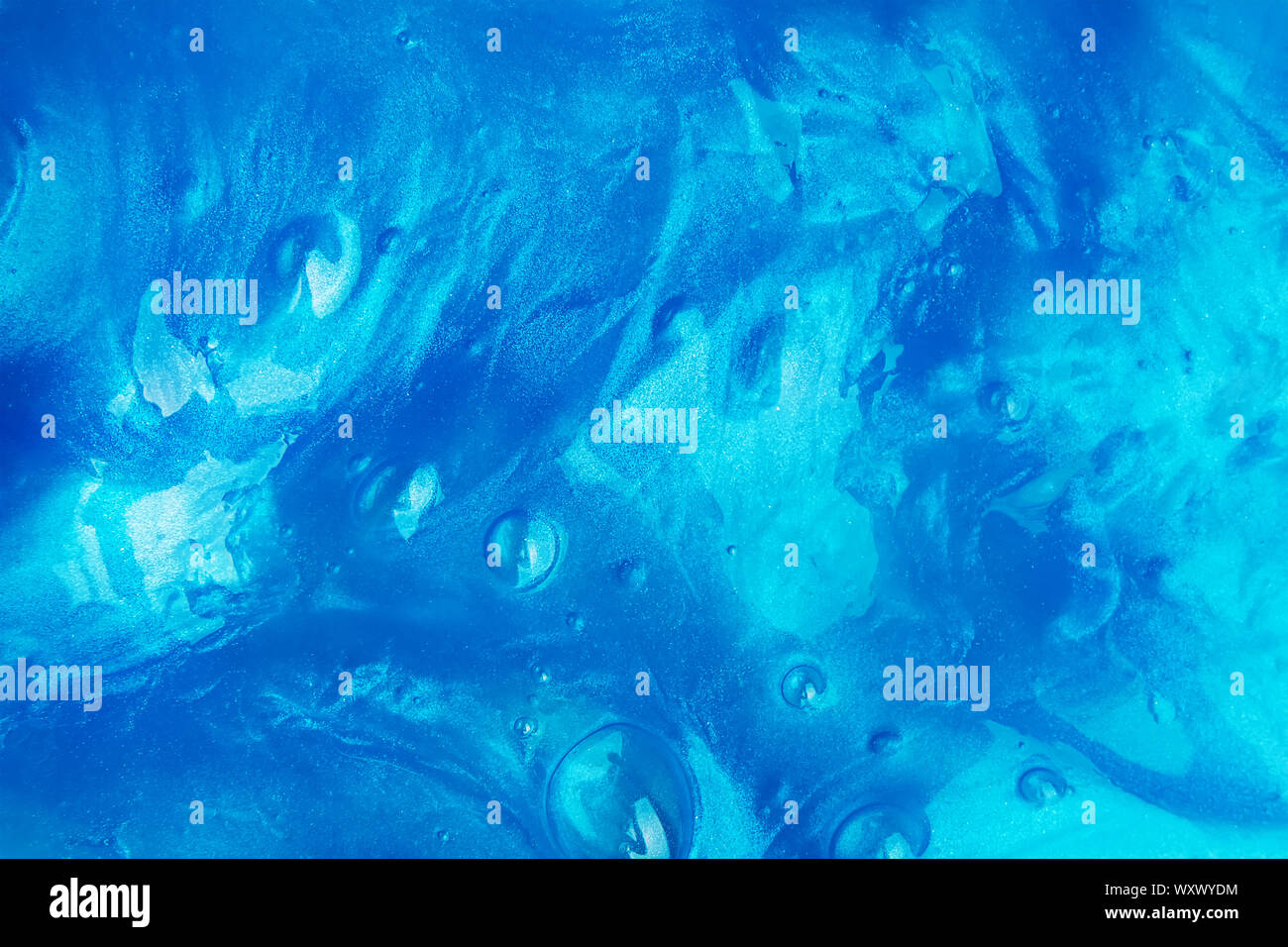 Résumé fond bleu avec la texture de la boue ou autre substance liquide Banque D'Images