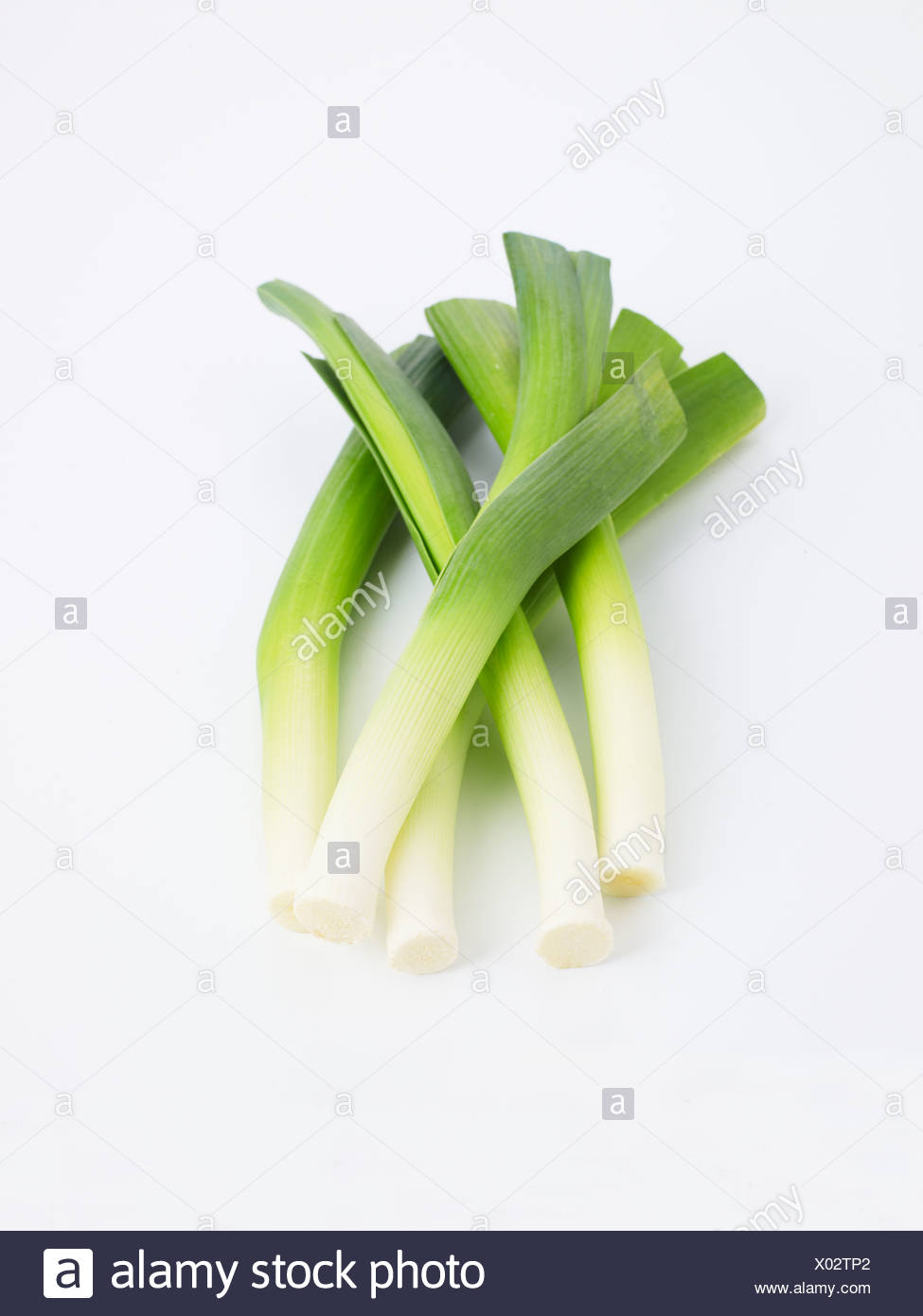 Les Poireaux De Bebe Sur Fond Blanc Photo Stock Alamy