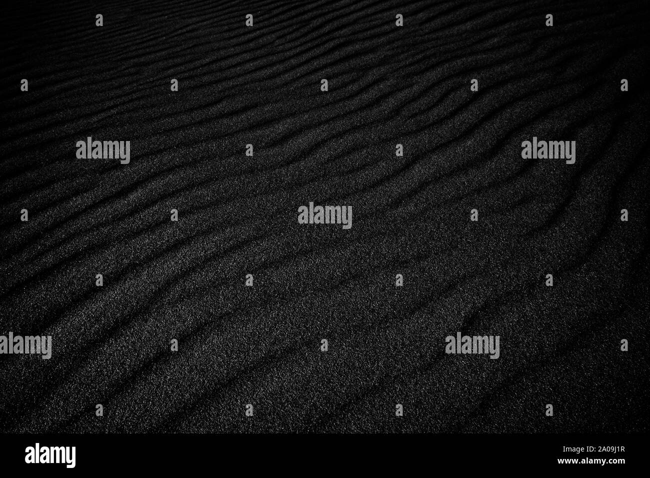 Nero onde di sabbia come sfondo Foto Stock