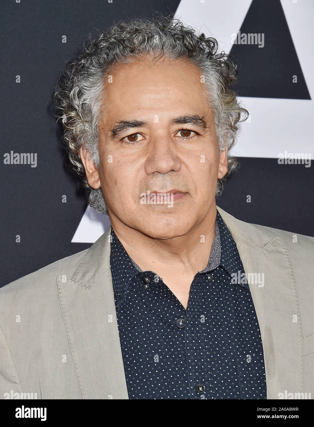 HOLLYWOOD, CA - 18 settembre: John Ortiz assiste la premiere del ventesimo secolo Fox " Ad Astra' alla Cupola di Glossari Affini il 18 settembre 2019 a Los Angeles, California. Foto Stock
