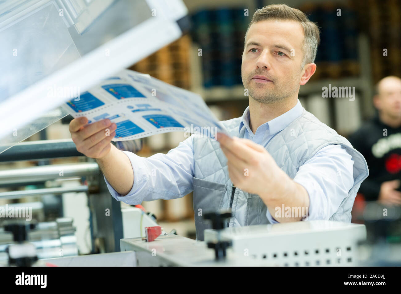 Macchina per la produzione di pellicole di plastica con stampe Foto Stock