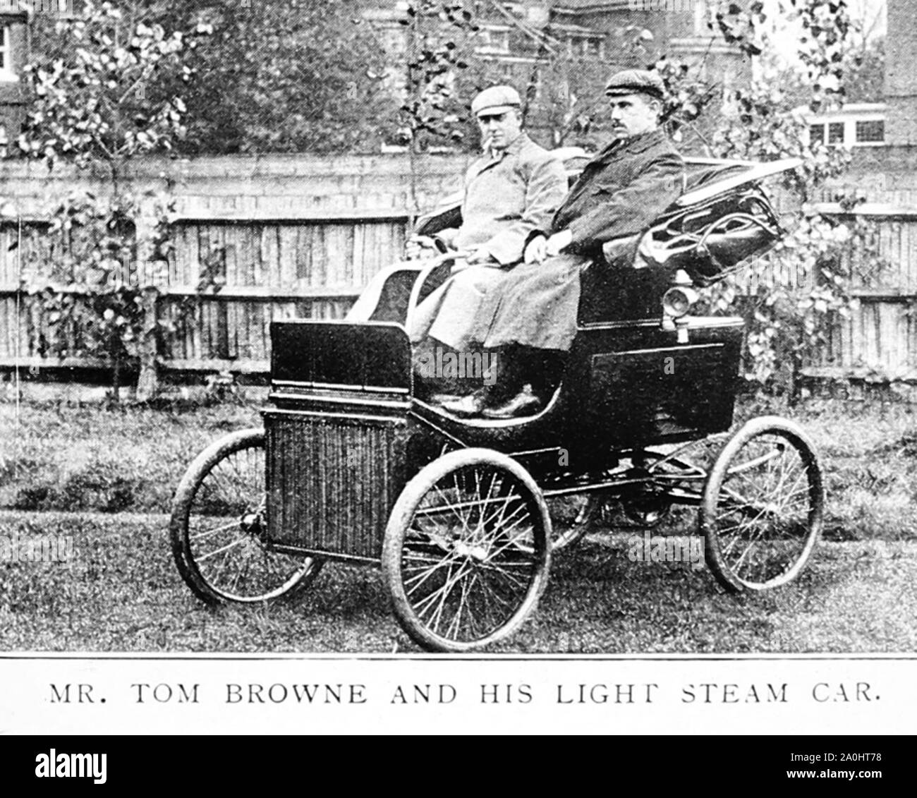 Tom Browne nella sua luce auto a vapore, agli inizi del novecento Foto Stock