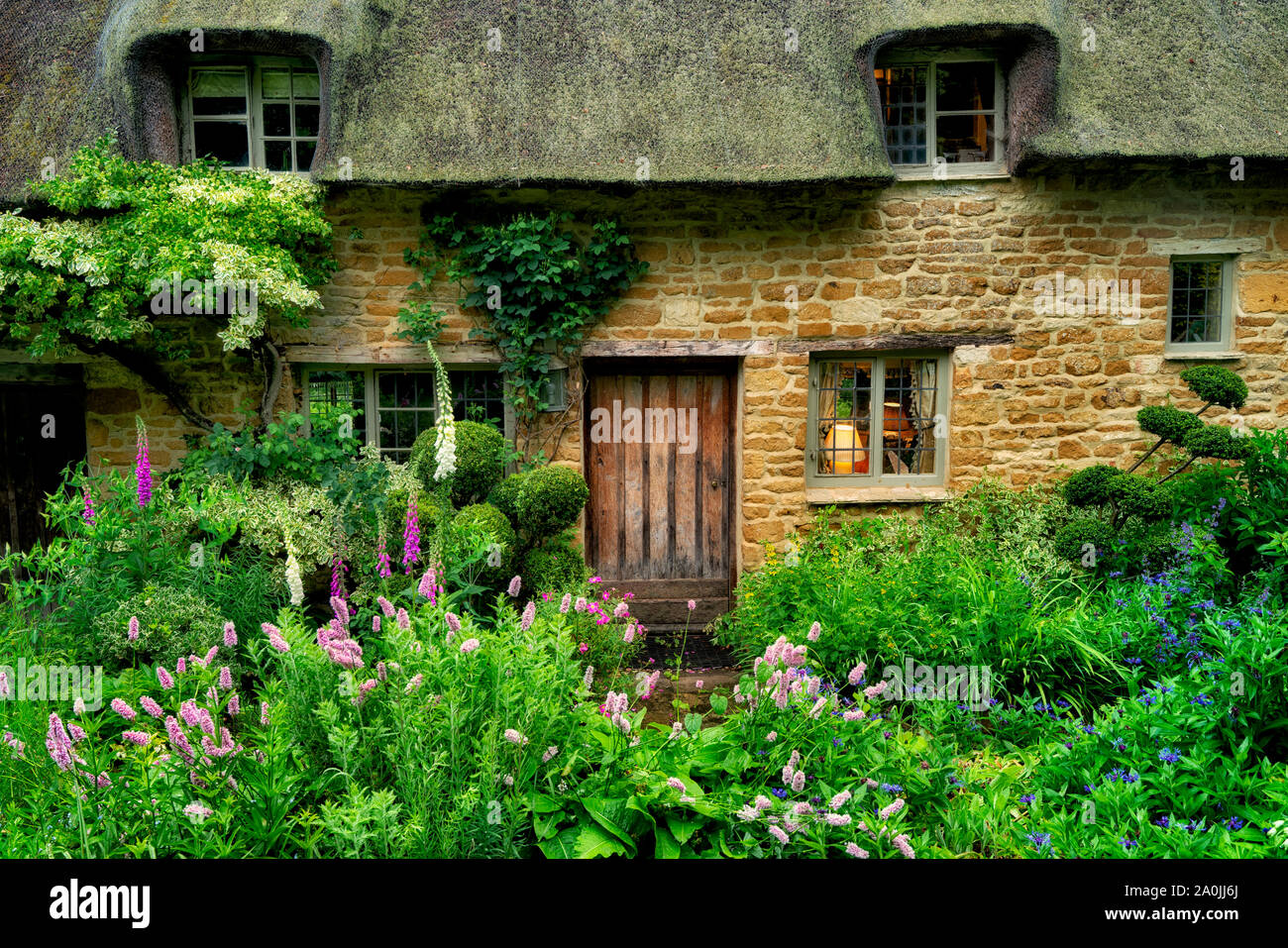 Cottage e giardino in Chastleton. I Cotswolds, Inghilterra Foto Stock