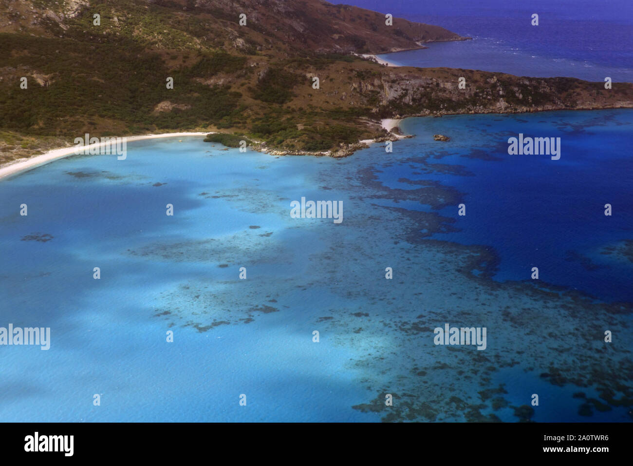 Vista aerea di Lizard Island laguna i coralli e la spiaggia, nel nord della Grande Barriera Corallina, Queensland, Australia Foto Stock