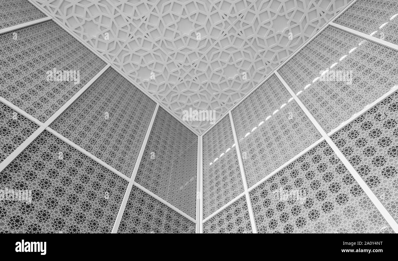 Surround di vetro e il soffitto con motivo geometrico presso il giardino di tranquillità, semplice cortile islamica all'Aga Khan Centro, Kings Cross, London REGNO UNITO. Foto Stock