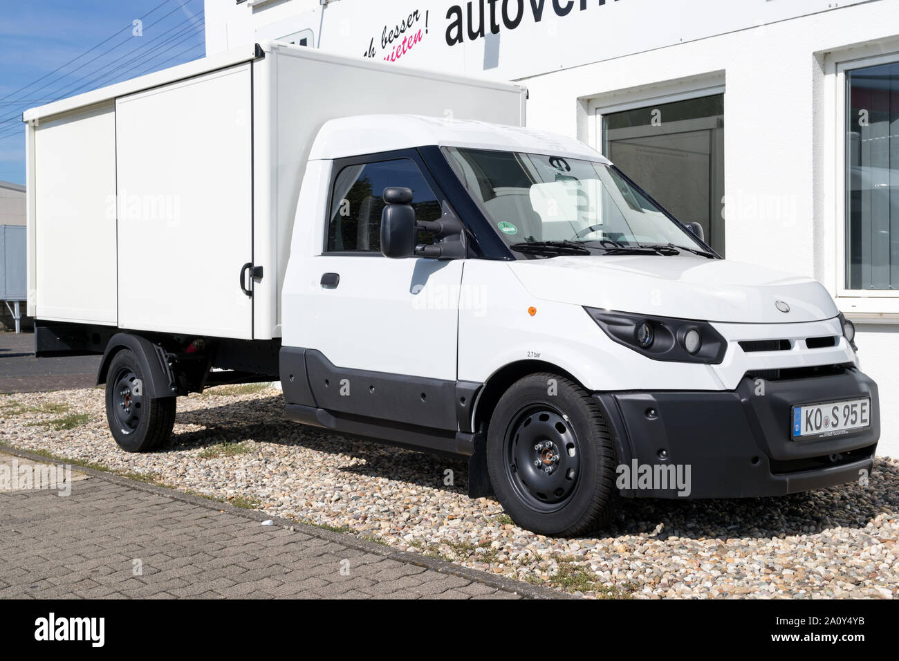 StreetScooter lavoro. StreetScooter è un veicolo elettrico e produttore è stata di proprietà da parte di Deutsche Post DHL Group dal 2014. Foto Stock