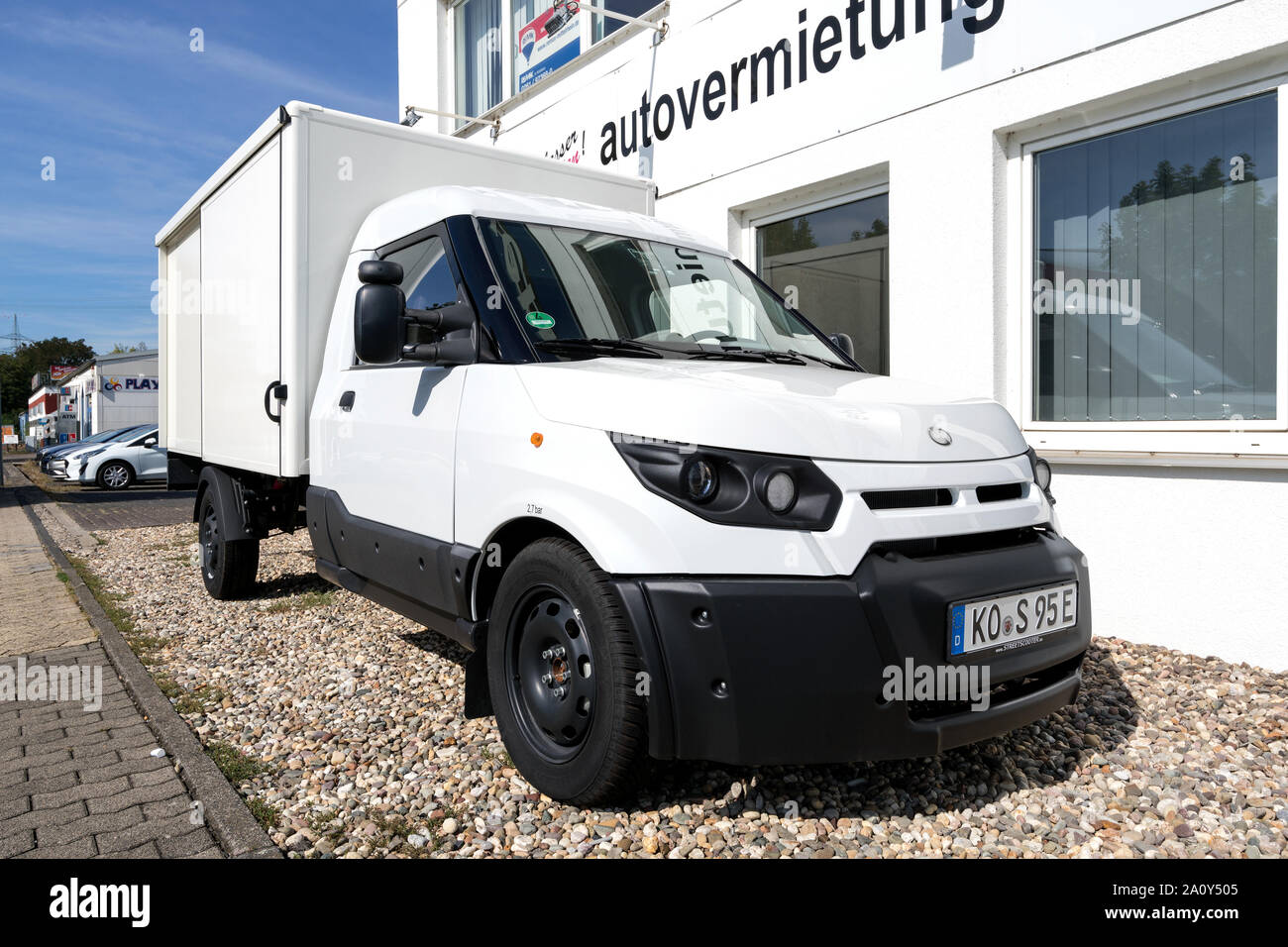 StreetScooter lavoro. StreetScooter è un veicolo elettrico e produttore è stata di proprietà da parte di Deutsche Post DHL Group dal 2014. Foto Stock