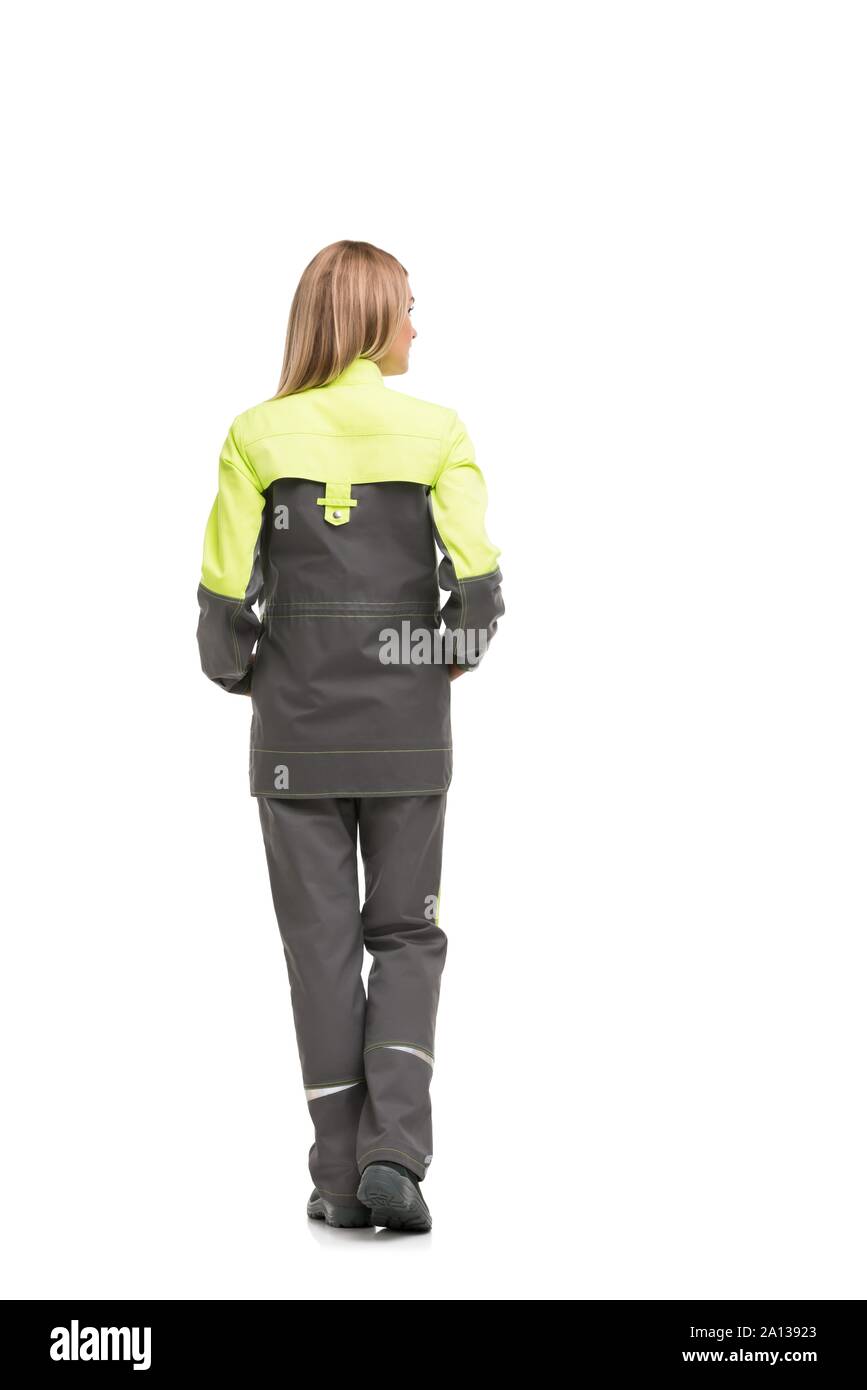 Bionda in abiti da lavoro isolato dietro la vista Foto Stock