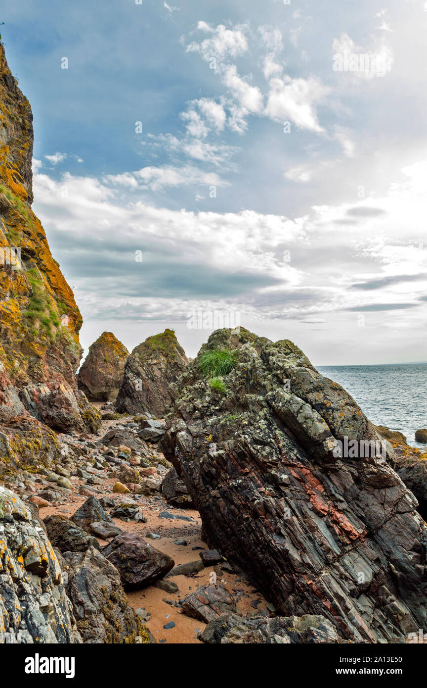 ROSEMARKIE AI PIEDI DI CROMARTY Black Isle Scozia pile di mare sulla spiaggia di SCART AREA di Craig Foto Stock