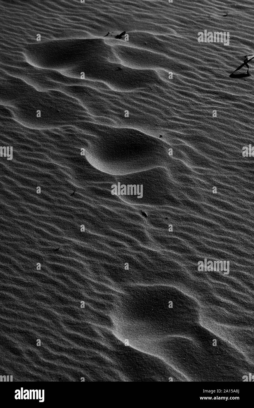 Impronte sulla spiaggia Foto Stock