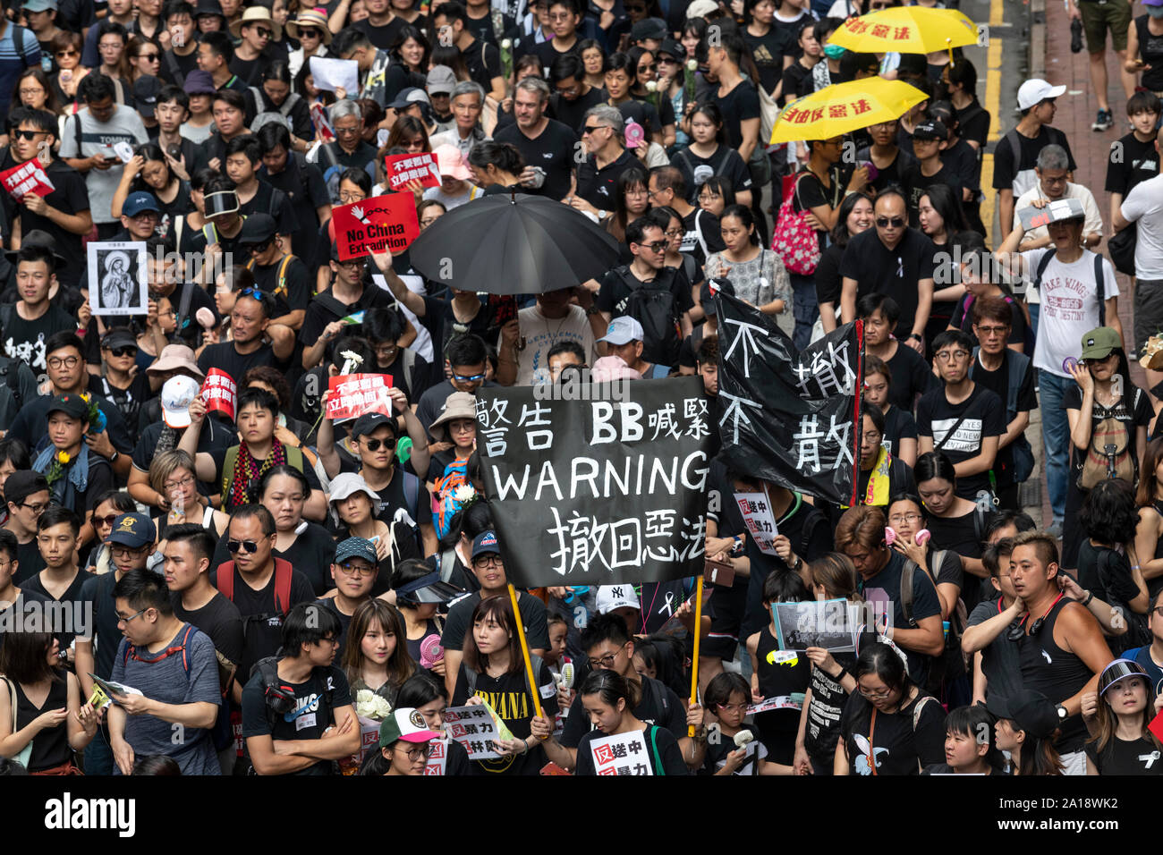 Manifestanti marzo a Hong Kong contro la legge in materia di estradizione presentata dal Chief Executive Carrie Lam. Sospensione del disegno di legge non riesce a fermare il marzo.Jayne Foto Stock