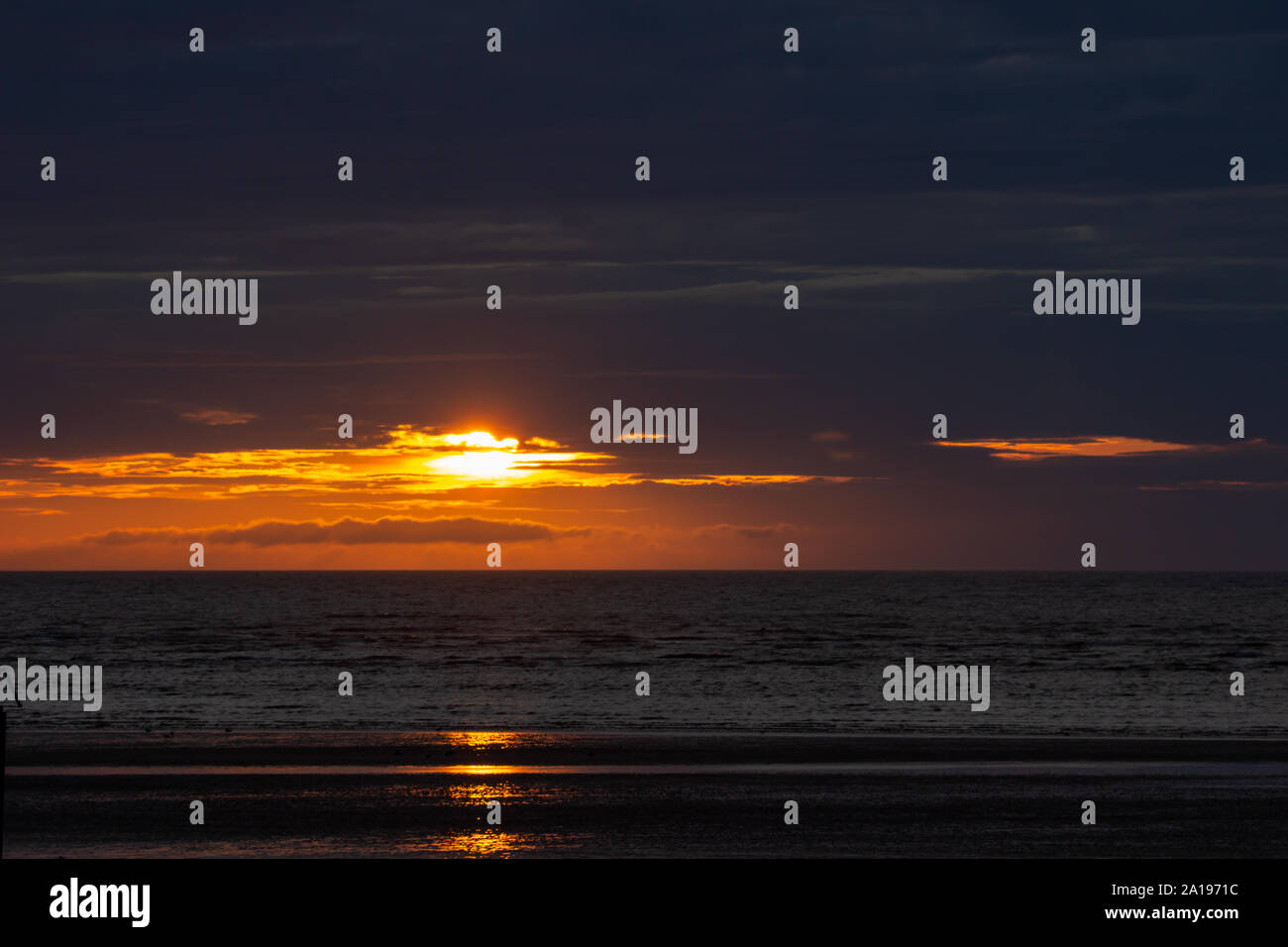 Bel tramonto in Rhyl Beach Wales UK Foto Stock