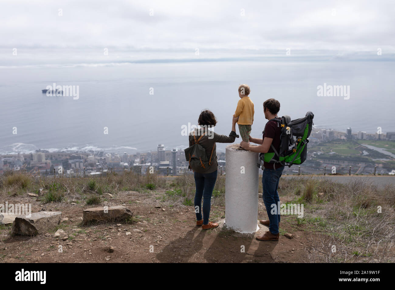 I genitori godersi il tempo con il loro bambino Foto Stock