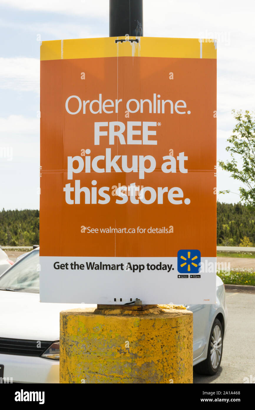 Segno pubblicità Walmart App per consentire l'ordinazione online e raccolta in negozio. Foto Stock
