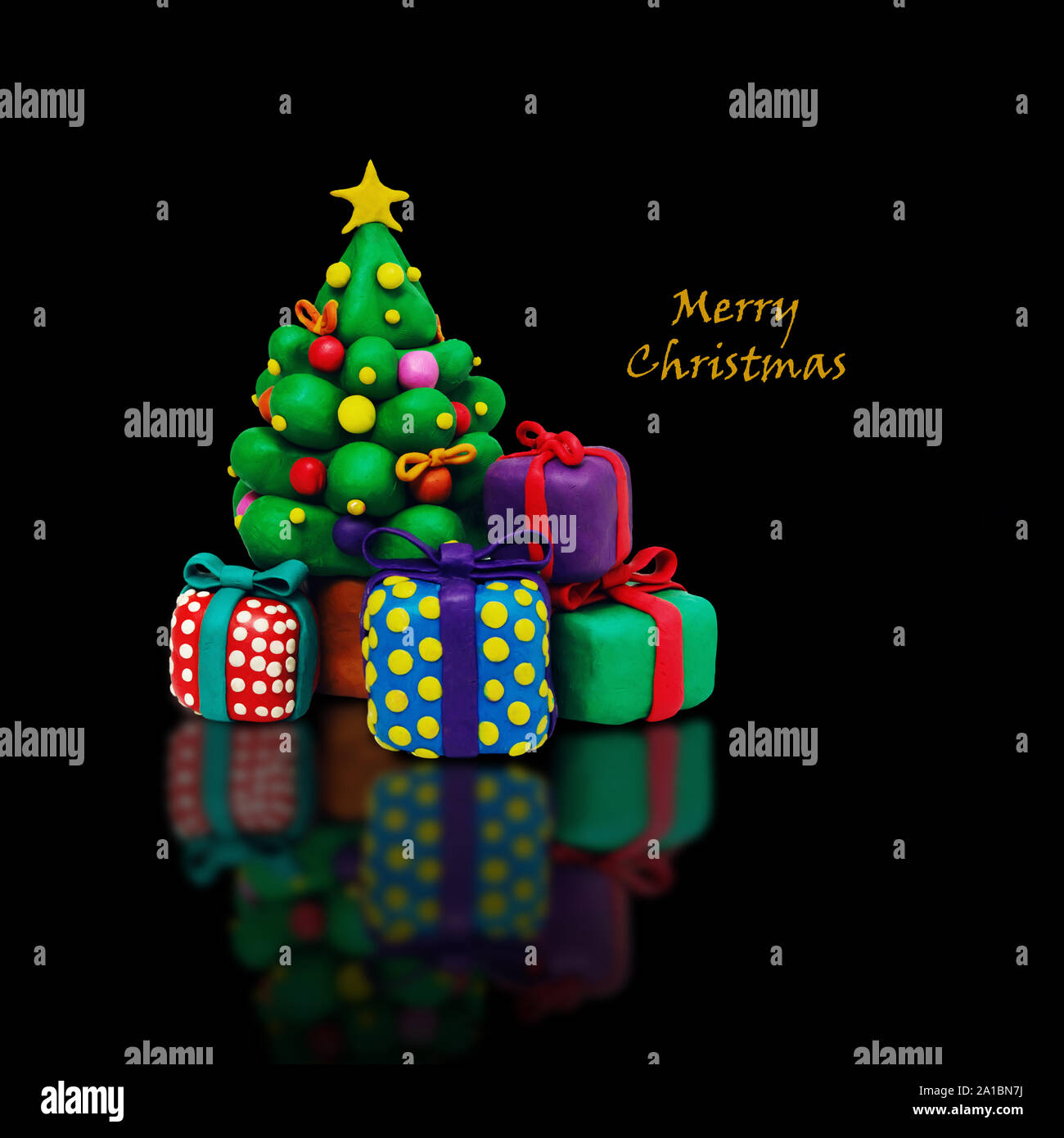 Plastilina albero di natale con la scimmia Foto Stock