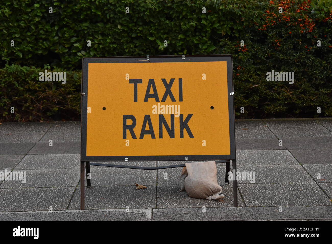 Segno sulla pavimentazione - taxi, gravata da un contrappeso. Foto Stock