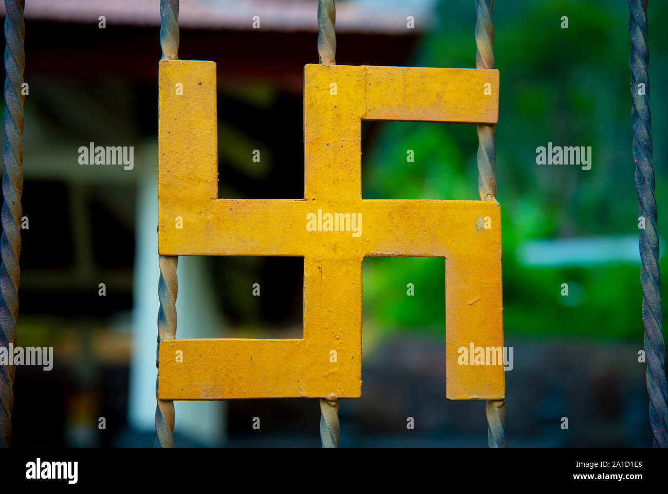 L'Antica svastica segno religioso Foto Stock