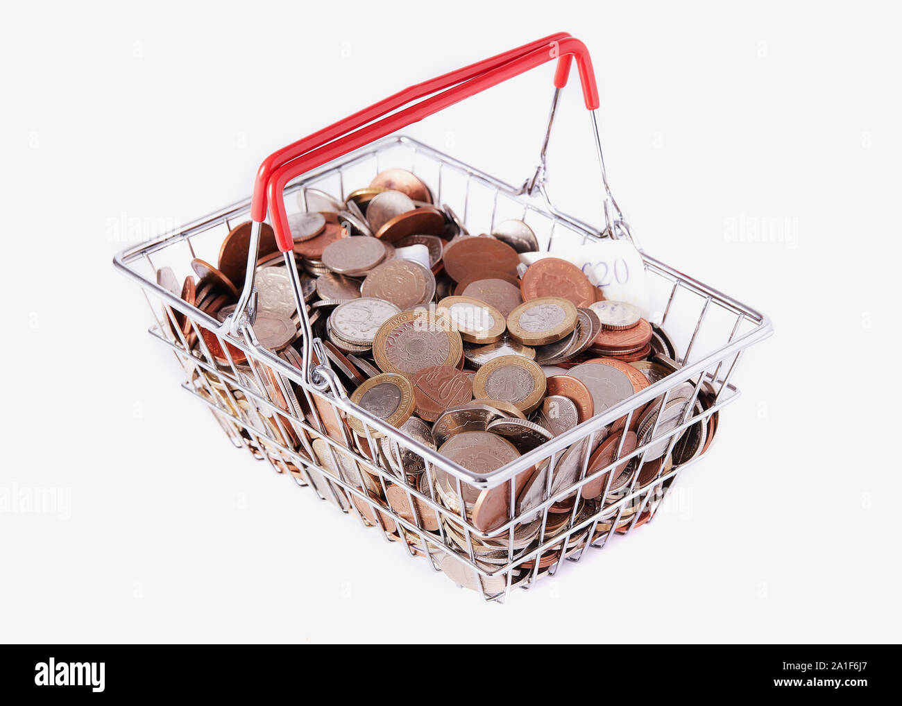 Carrello riempito di monete Foto Stock