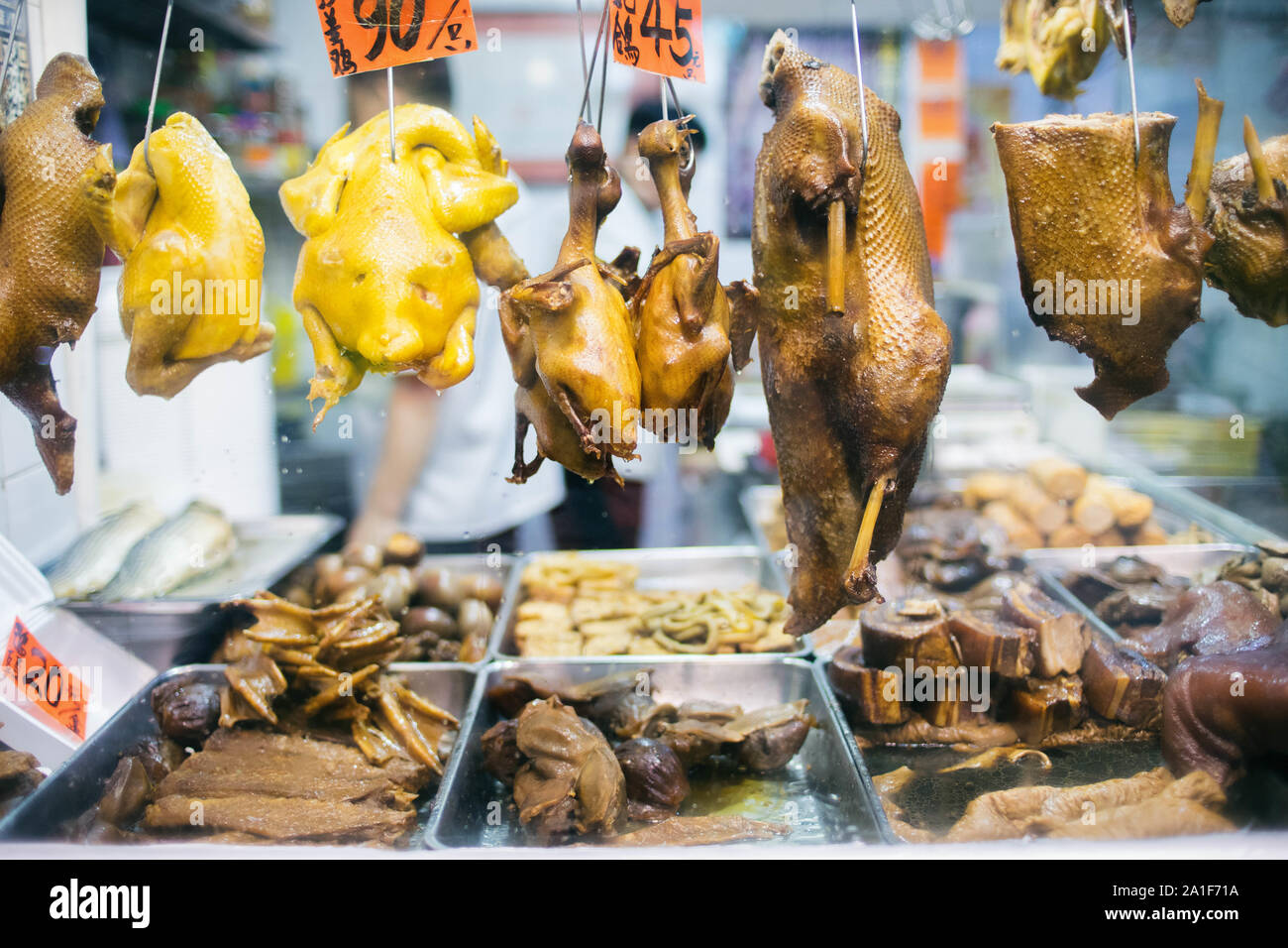 Negozio di Hong kong che vende barbecue arrosto di carne di pollame in asia modo. Foto Stock