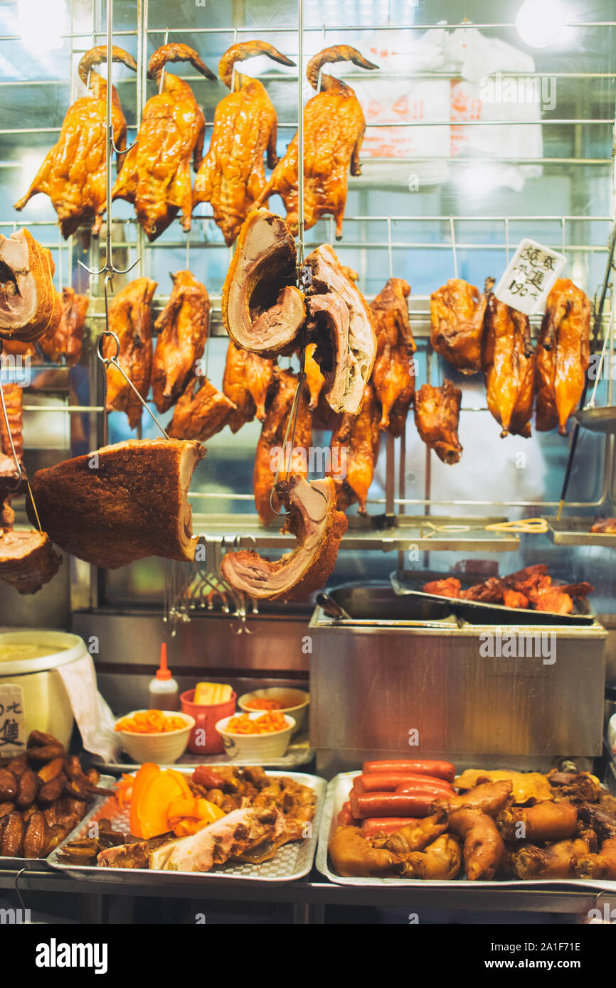 Negozio di Hong kong che vende barbecue arrosto di carne di pollame in asia modo. Foto Stock