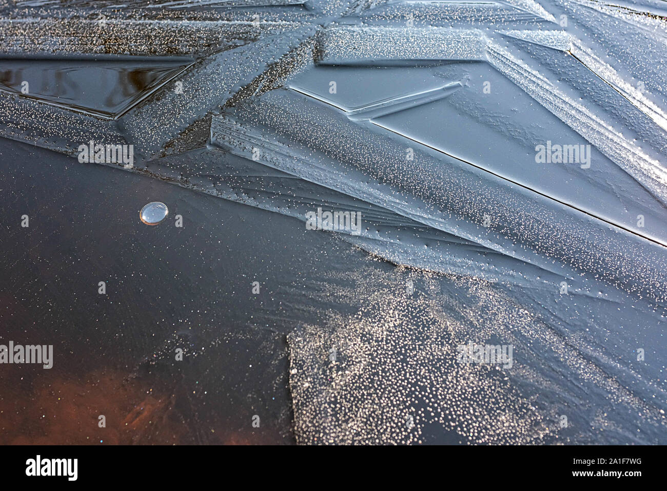 Arte nella Natura, lastre di ghiaccio sul lago Ammersee Foto Stock