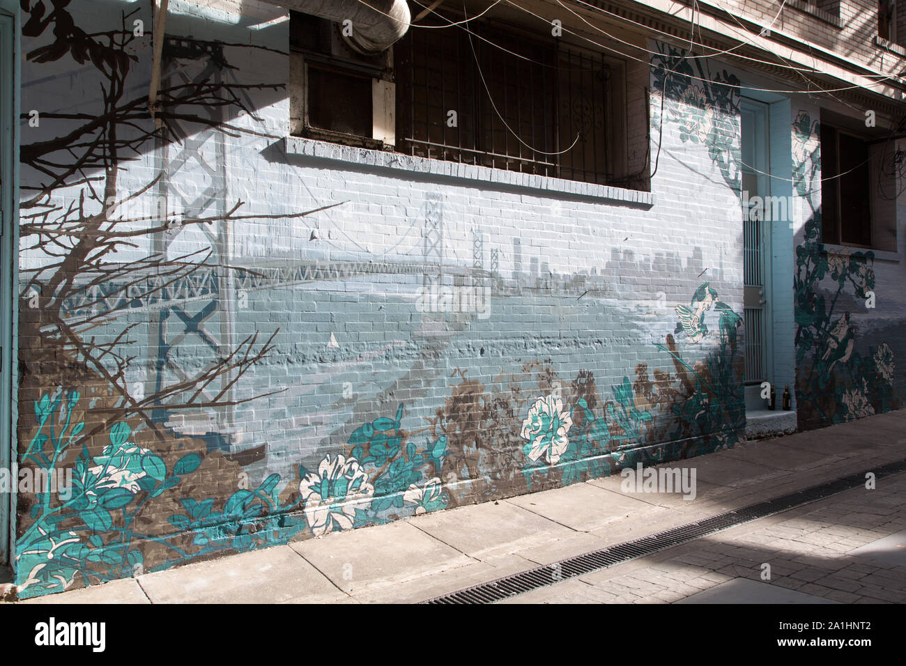 Murale il ponte vicino al City Lights Bookstore di San Francisco, California Foto Stock